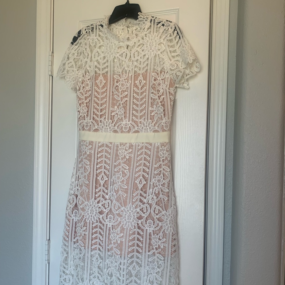 White lace dress with nude lining
